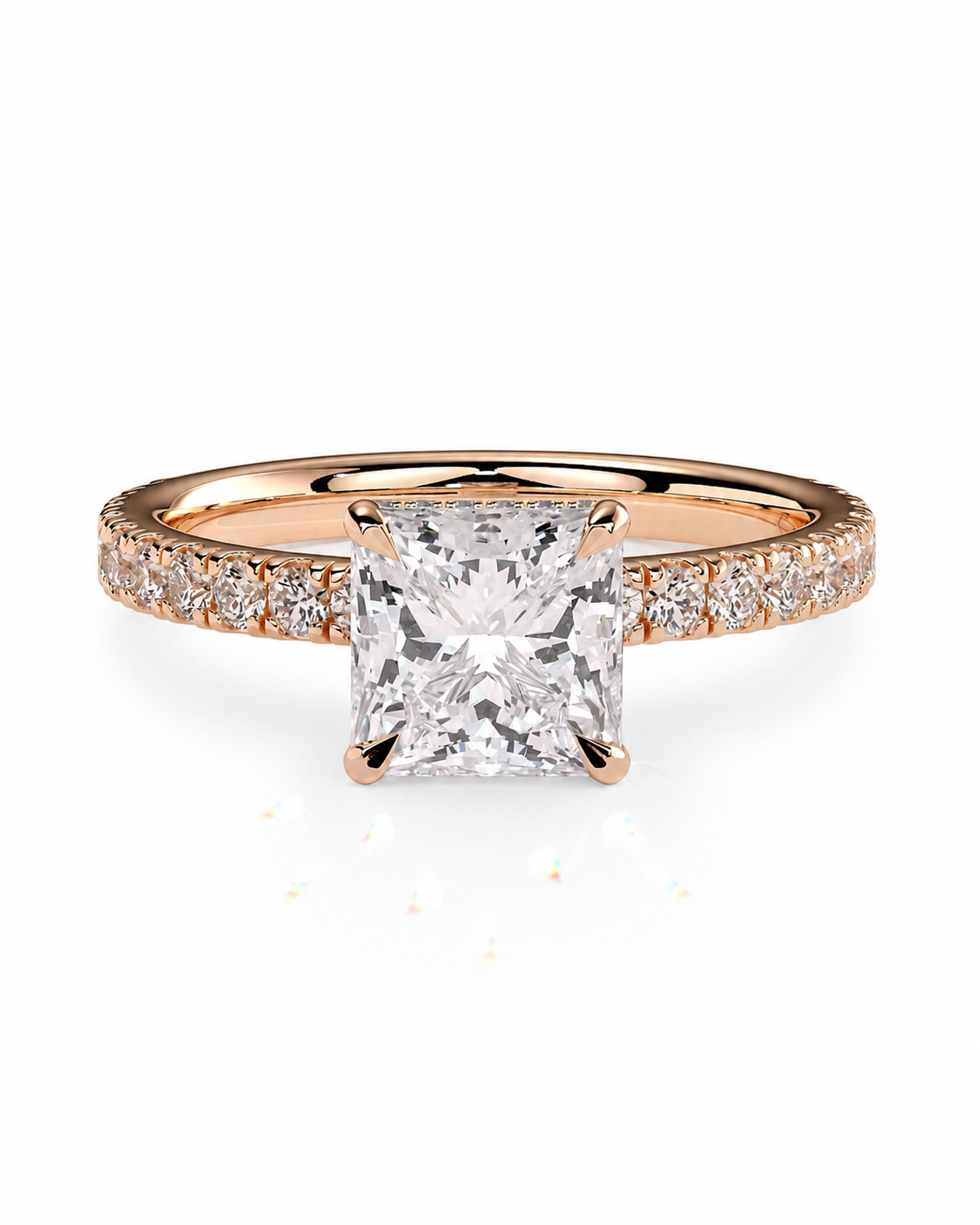 color_10K_RG, color_14K_RG &&A rose gold engagement ring featuring a large princess-cut diamond center stone and a pave diamond band, set against a clean white background.