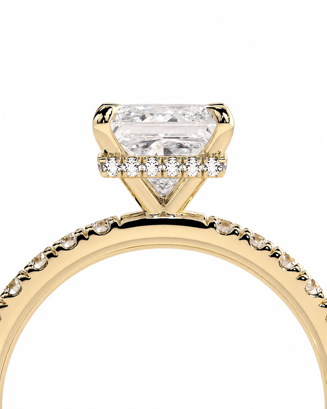 color_10K_YG, color_14K_YG &&Close-up of a Princess cut moissanite engagement ring with round pave side stones.