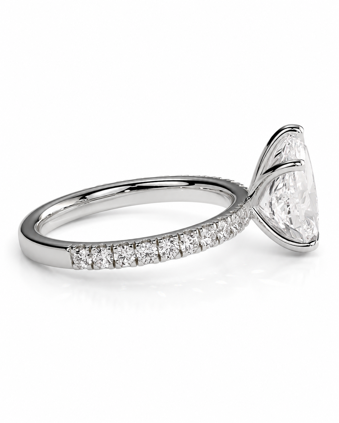 color_925_SIL,color_935_ARG,color_10K_WG, color_14K_WG &&A silver-toned diamond engagement ring featuring a large marquise-cut center stone in a prong setting, with a pave band of small round diamonds, shown on a clean white background.