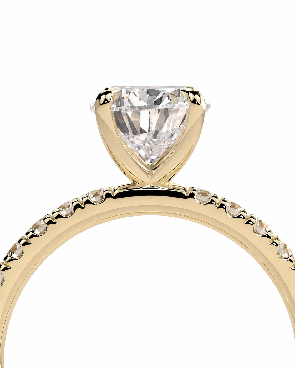 color_10K_YG, color_14K_YG &&Close-up of a pear moissanite engagement ring with round pave accent stones.