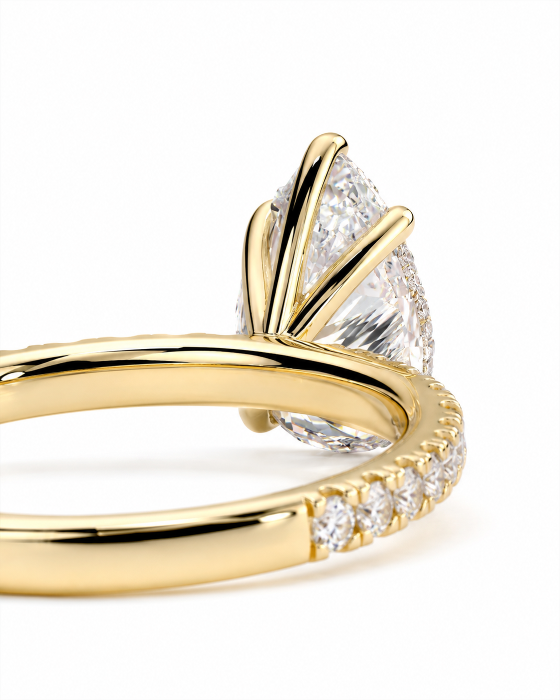 color_10K_YG, color_14K_YG &&Luxury pear moissanite ring featuring a brilliant pear-cut center stone.
