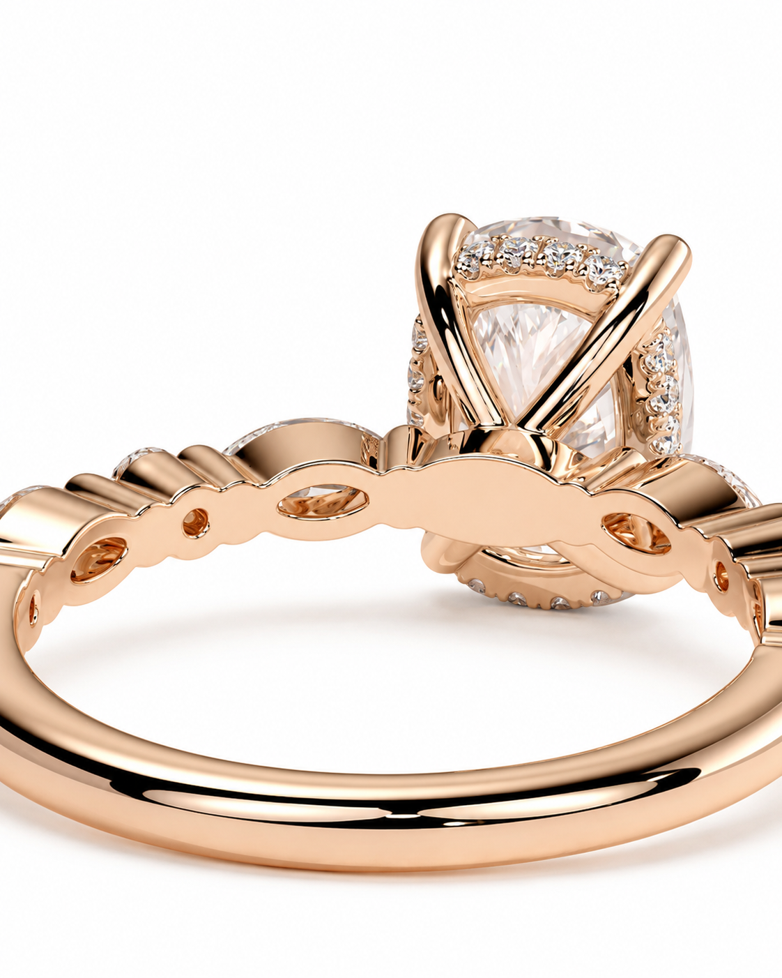 color_10K_RG, color_14K_RG &&Rose gold engagement ring with a cushion-cut center stone and pave accents, shown in a close-up studio shot on a white background.
