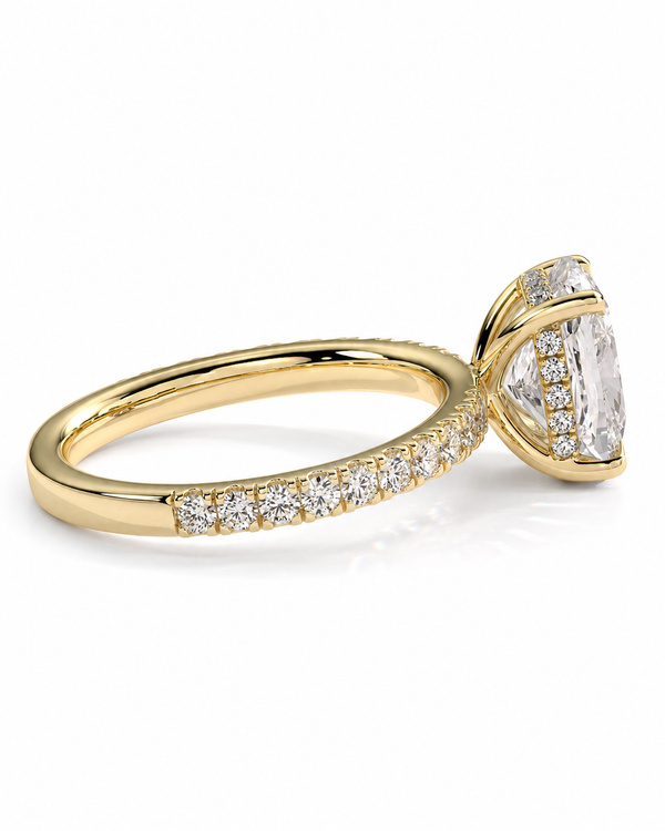 color_10K_YG, color_14K_YG &&A yellow gold engagement ring featuring a marquise-cut clear center stone and a pave-set diamond band, shown on a clean white background.