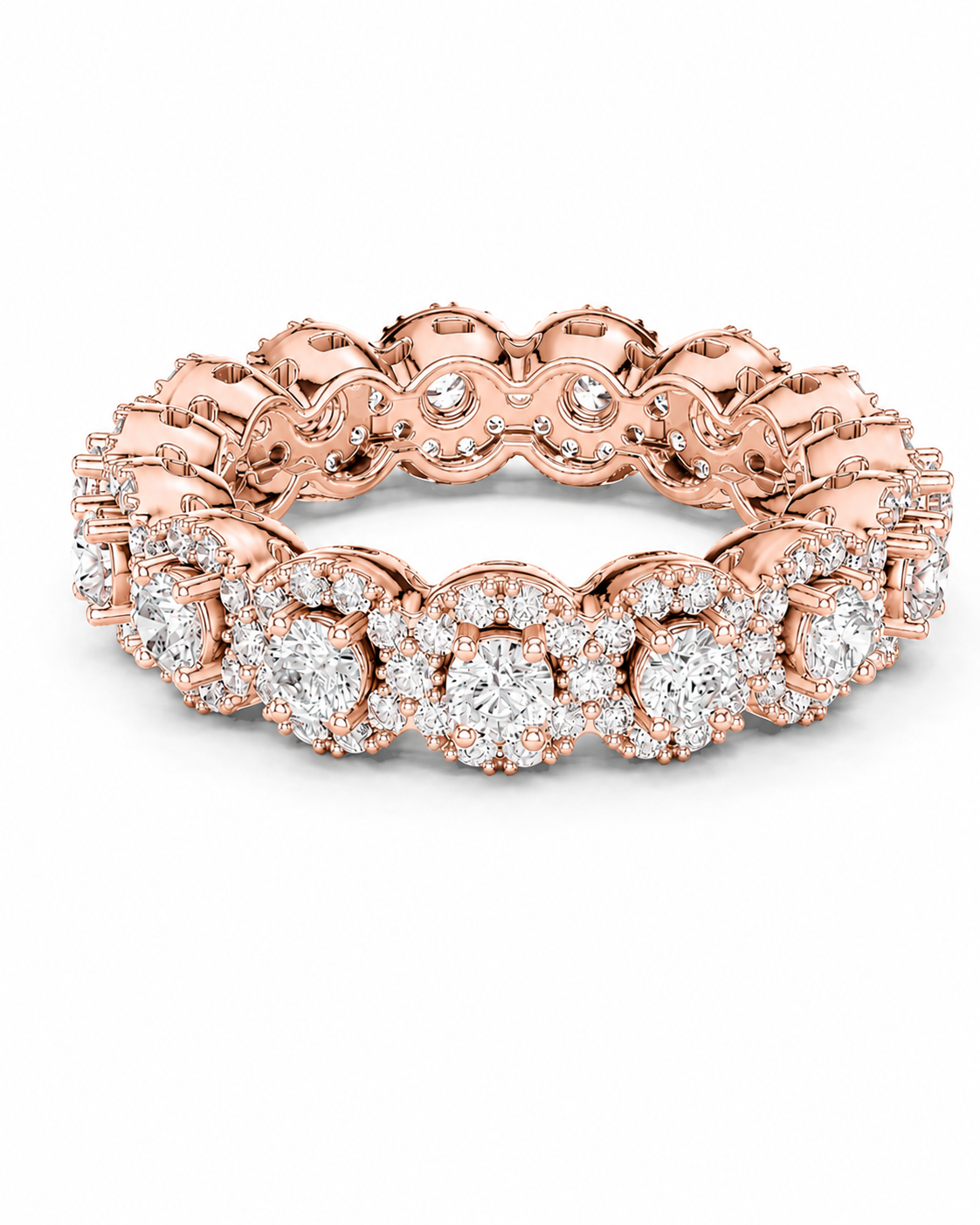 color_10K_RG, color_14K_RG &&	A rose gold eternity ring featuring a continuous line of round-cut diamonds in halo settings, shown on a clean white background.