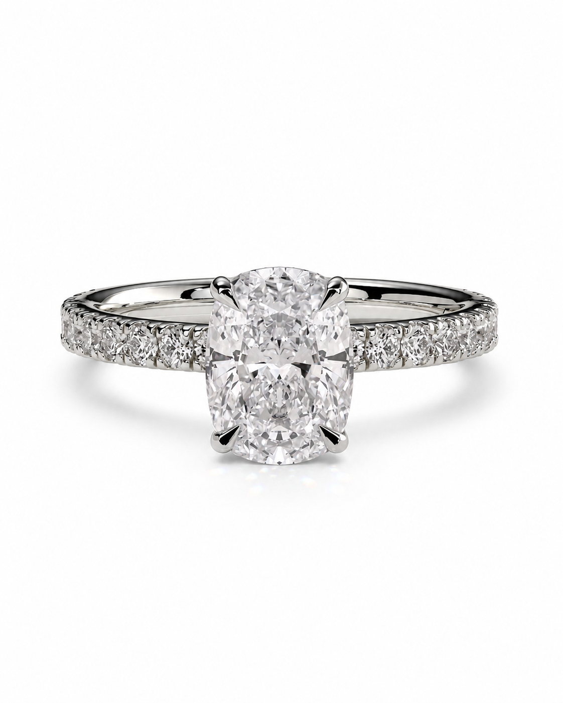 color_925_SIL,color_935_ARG,color_10K_WG, color_14K_WG &&A radiant cut diamond engagement ring with a pave band in a silver-colored metal, shown on a clean white background.