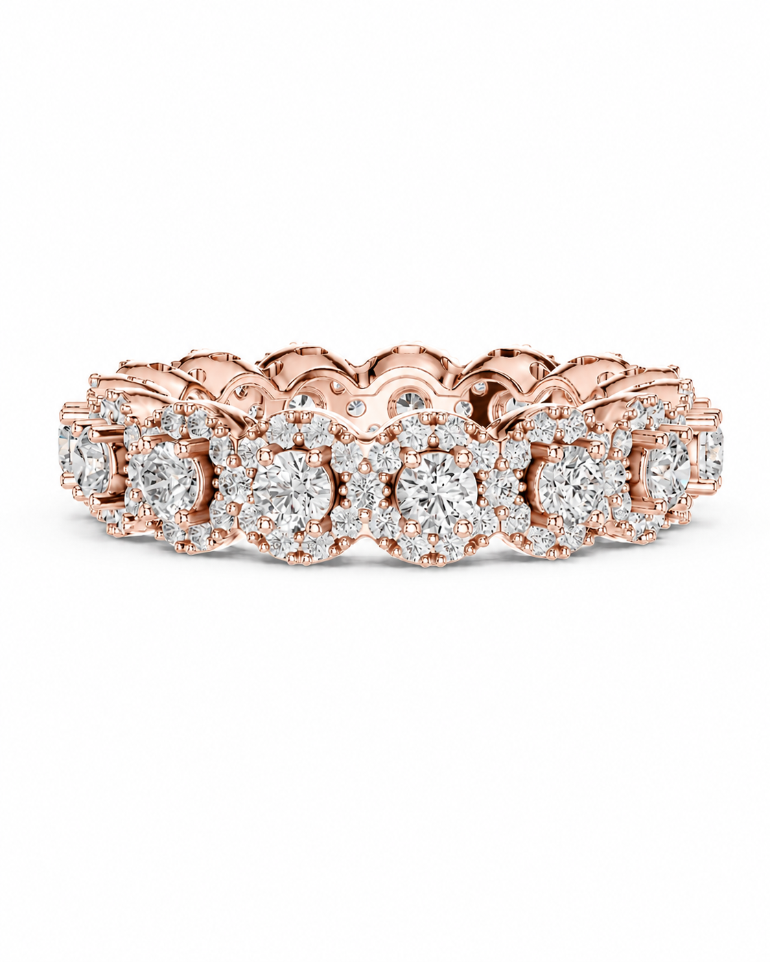 color_10K_RG, color_14K_RG &&	A rose gold eternity ring set with round brilliant-cut diamonds and smaller diamond accents, shown on a clean white background.
