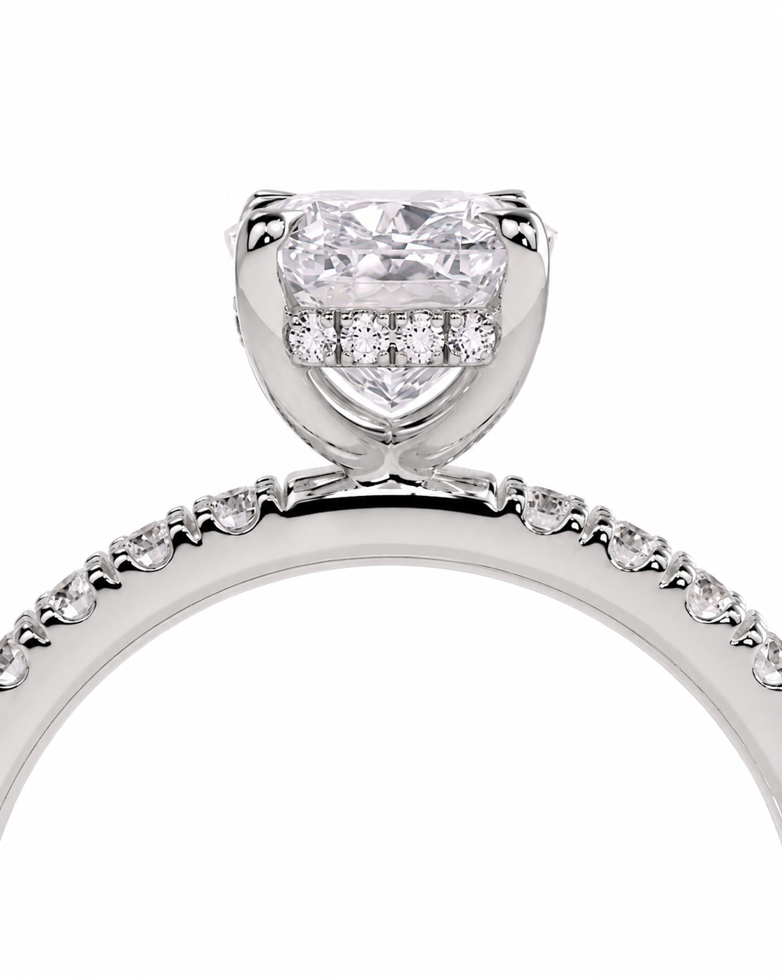 color_925_SIL,color_935_ARG,color_10K_WG, color_14K_WG &&A close-up studio shot of a silver-toned diamond engagement ring featuring a large round-cut center stone and a halo of smaller diamonds, with a pave-set band on a white background.
