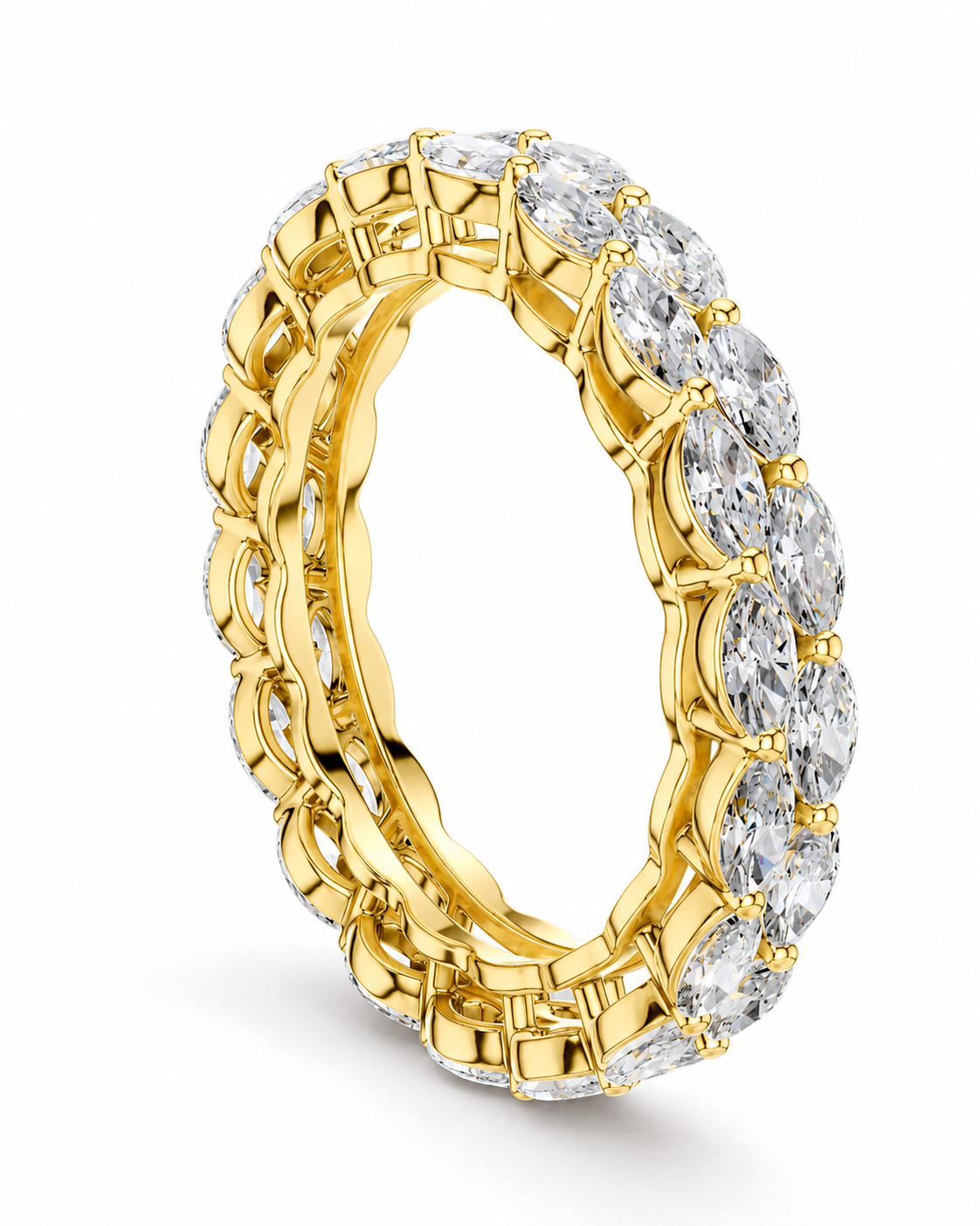 color_10K_YG, color_14K_YG &&	
A yellow gold eternity ring featuring a continuous row of round brilliant-cut clear gemstones in a prong setting, shown on a clean white background.