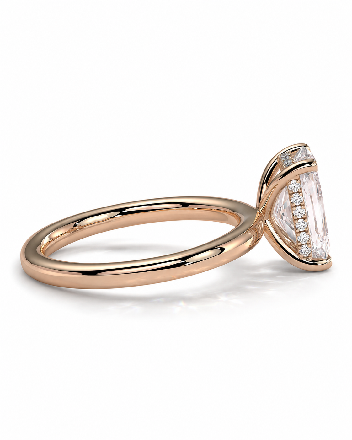 color_10K_RG, color_14K_RG &&Rose gold ring with a large marquise-cut clear gemstone in a prong setting, accented by small pave diamonds along the side, shown on a white background.