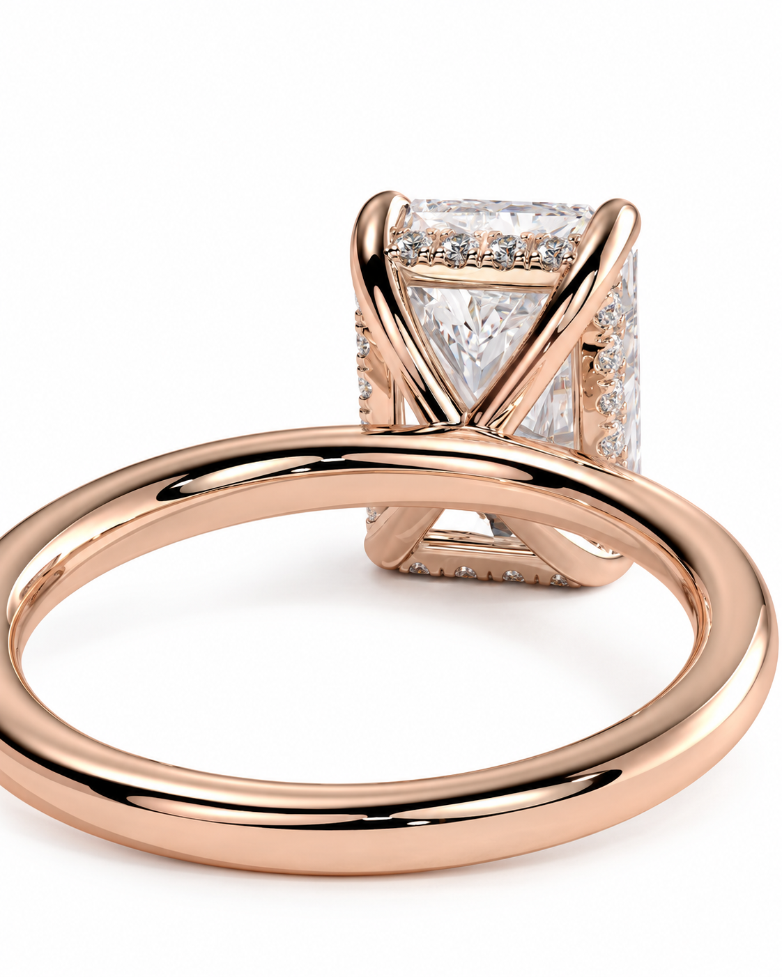 color_10K_RG, color_14K_RG &&Rose gold ring with a square-cut clear gemstone in a prong setting, shown on a clean white background.