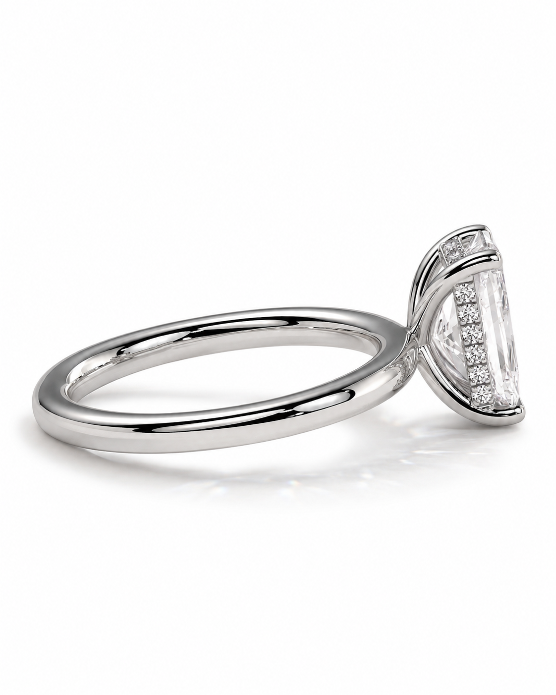 color_925_SIL,color_935_ARG,color_10K_WG, color_14K_WG &&A silver-toned diamond ring with a large rectangular clear center stone and smaller diamonds along the band, shown on a clean white background.