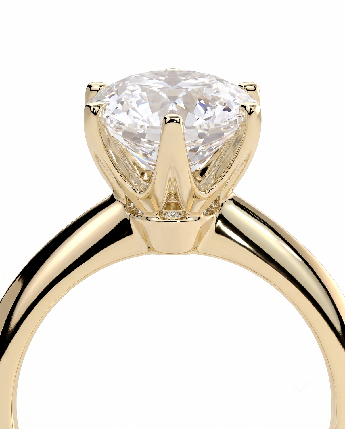 color_10K_YG, color_14K_YG &&A close-up shot of a yellow gold solitaire engagement ring with a round brilliant-cut diamond on a plain white background.