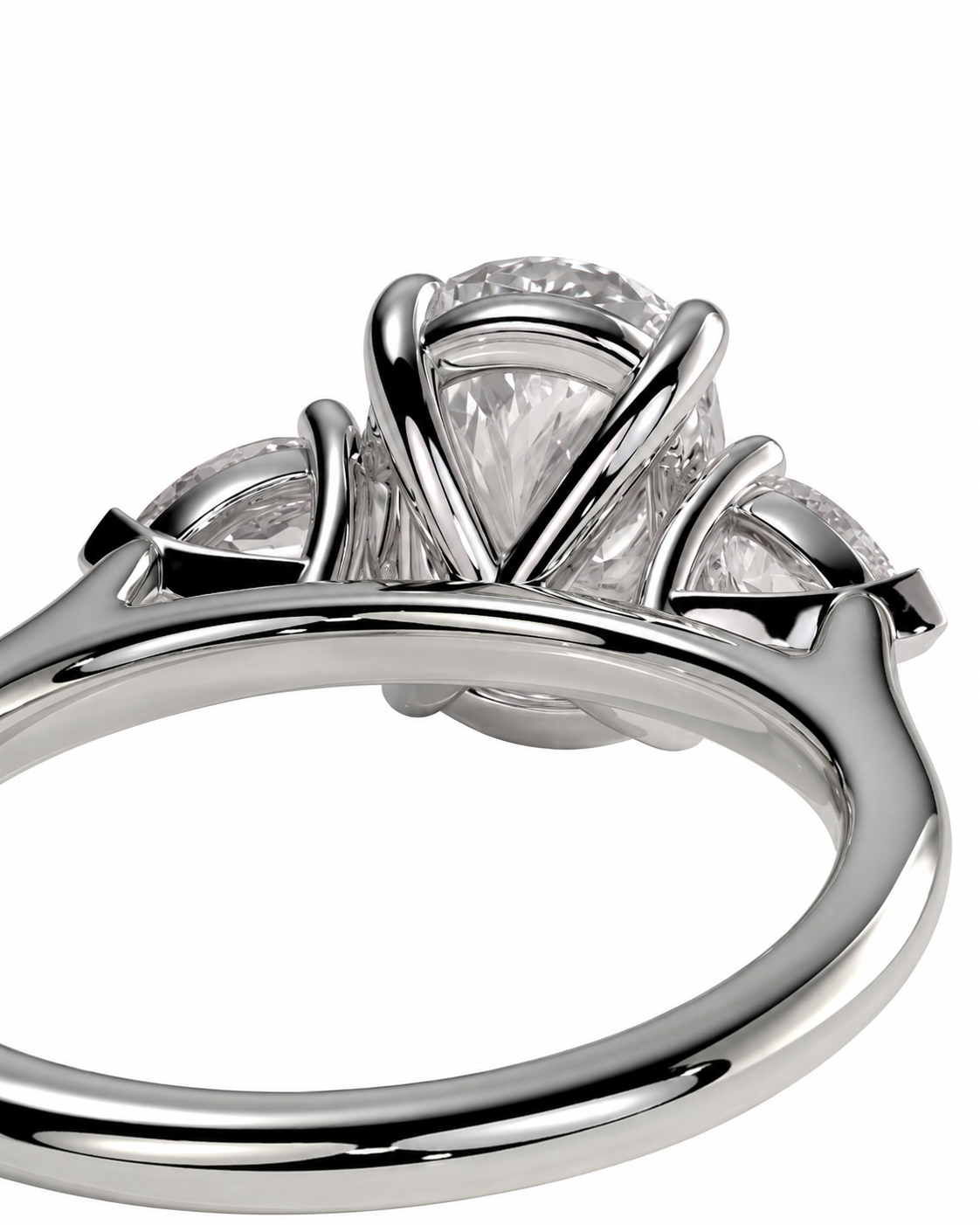 color_925_SIL,color_935_ARG,color_10K_WG, color_14K_WG &&A close-up studio shot of a silver-toned ring with a large clear oval center stone and smaller clear stones on each side, shown against a plain white background.