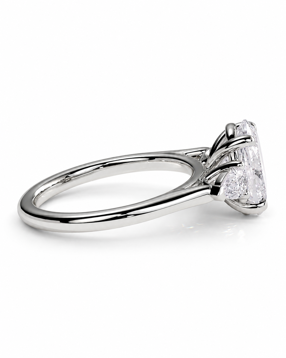 color_925_SIL,color_935_ARG,color_10K_WG, color_14K_WG &&A silver-toned diamond ring with a large round brilliant-cut center stone and baguette side stones, shown in a three-quarter side view on a white background.