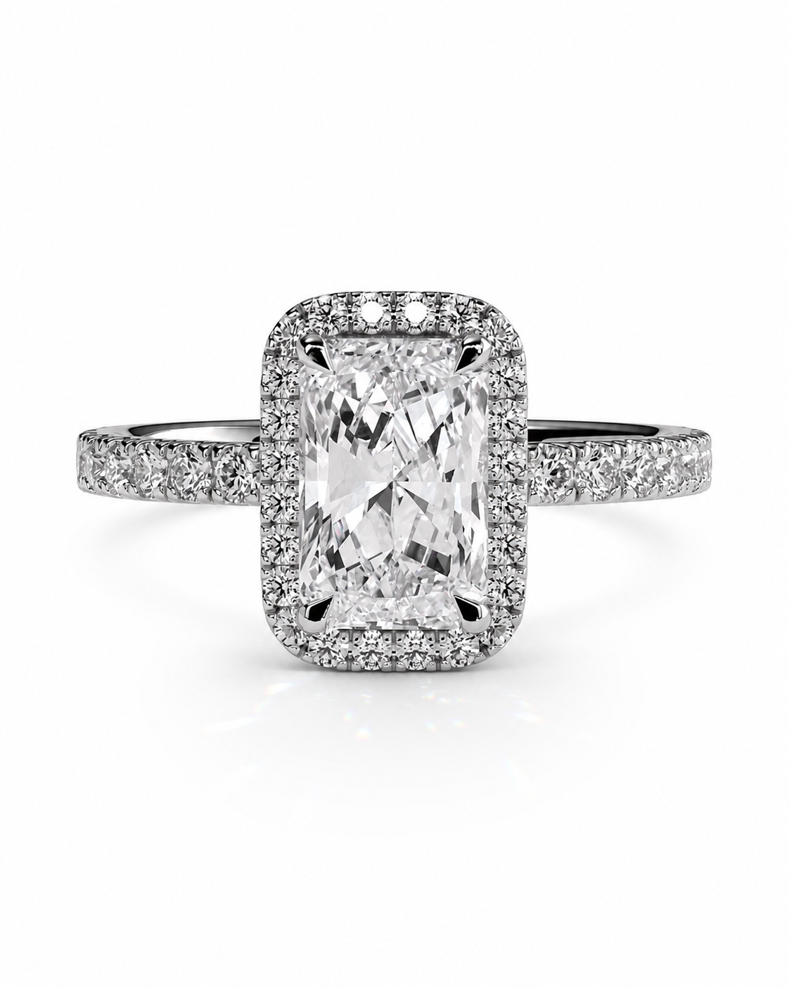 color_925_SIL,color_935_ARG,color_10K_WG, color_14K_WG &&A radiant cut diamond halo ring in silver-colored metal, featuring a large central diamond surrounded by a halo and a pave-set band, shown on a clean white background.