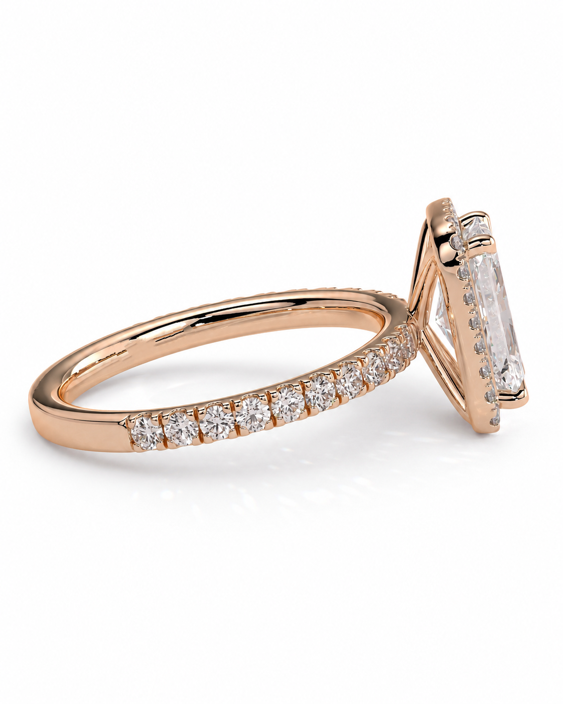 color_10K_RG, color_14K_RG &&Rose gold ring with a large rectangular clear gemstone and a pave band of small round diamonds, shown on a white background.