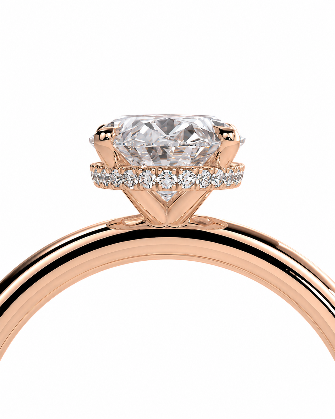 color_10K_RG, color_14K_RG &&Rose gold diamond engagement ring with a large round-cut center stone and a halo of small pave diamonds, shown on a white background.