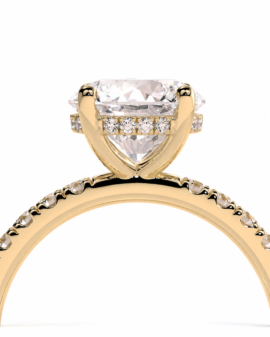 color_10K_YG, color_14K_YG &&A close-up shot of a yellow gold ring featuring a large marquise-cut clear center stone and smaller diamonds along the band and under the setting, presented on a solid white background.
