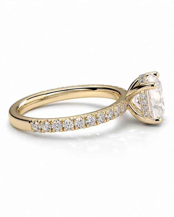 color_10K_YG, color_14K_YG &&A yellow gold diamond ring with a large oval-cut center stone and a pave band set with small round diamonds, shown on a clean white background.