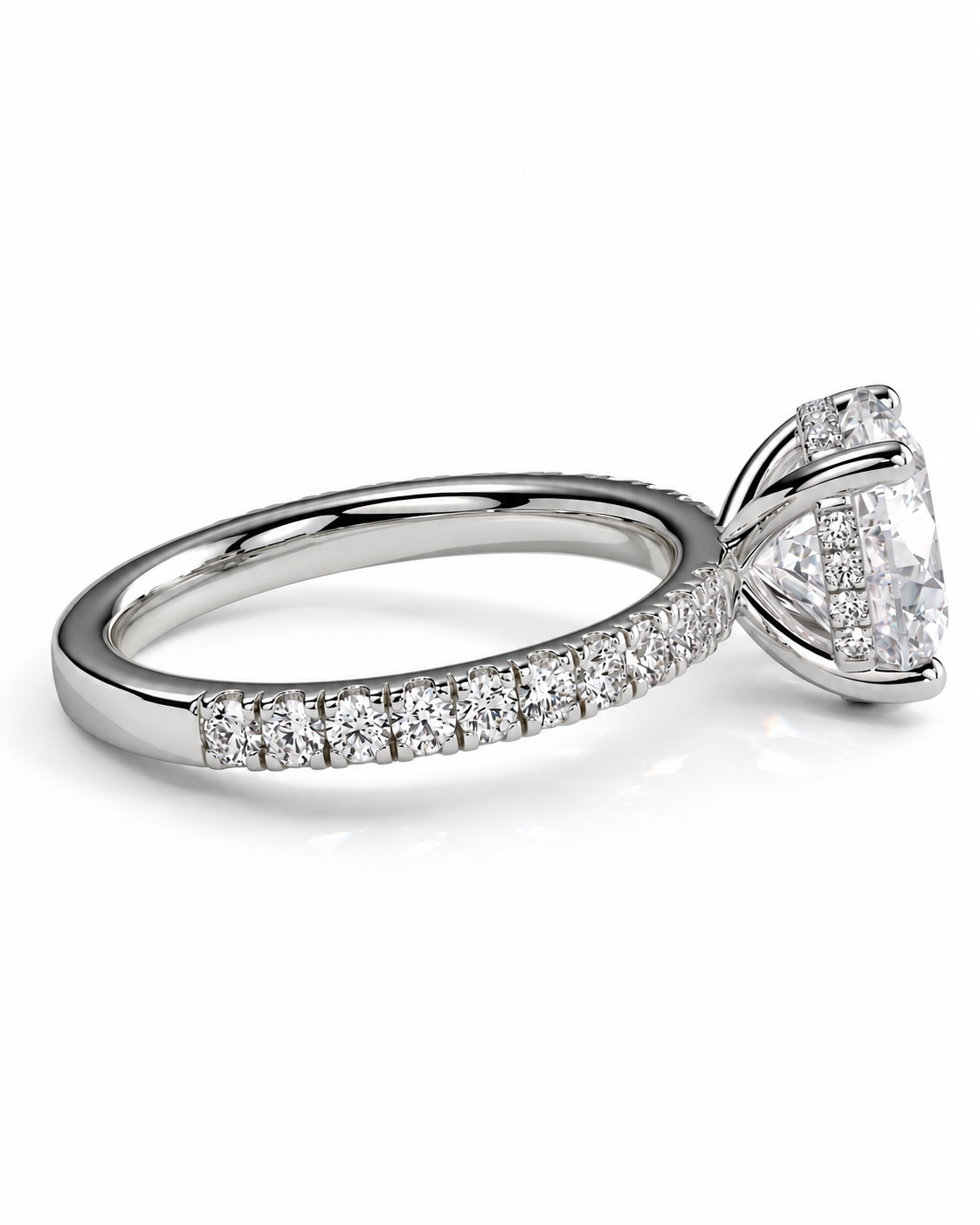 color_925_SIL,color_935_ARG,color_10K_WG, color_14K_WG &&A silver-toned diamond ring with a large pear-cut center stone and a pave band, shown on a clean white background.