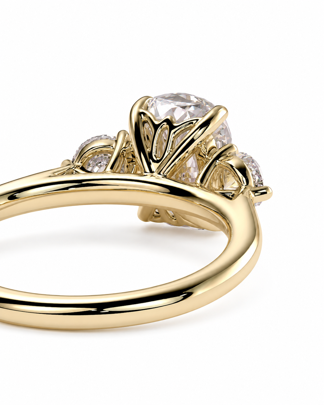 color_10K_YG, color_14K_YG &&A close-up shot of a yellow gold ring featuring a large round clear center stone and smaller side stones, set against a plain white background.