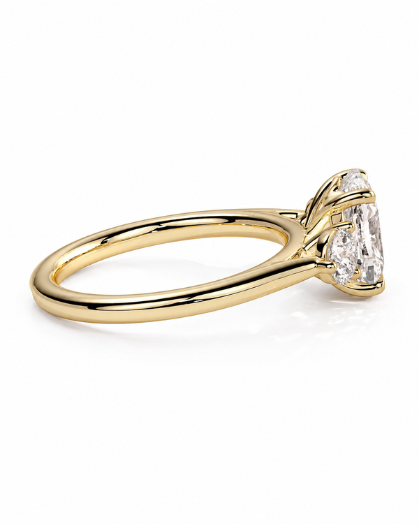 color_10K_YG, color_14K_YG &&A yellow gold solitaire engagement ring featuring a marquise-cut diamond, shown in a three-quarter side view on a clean white background.