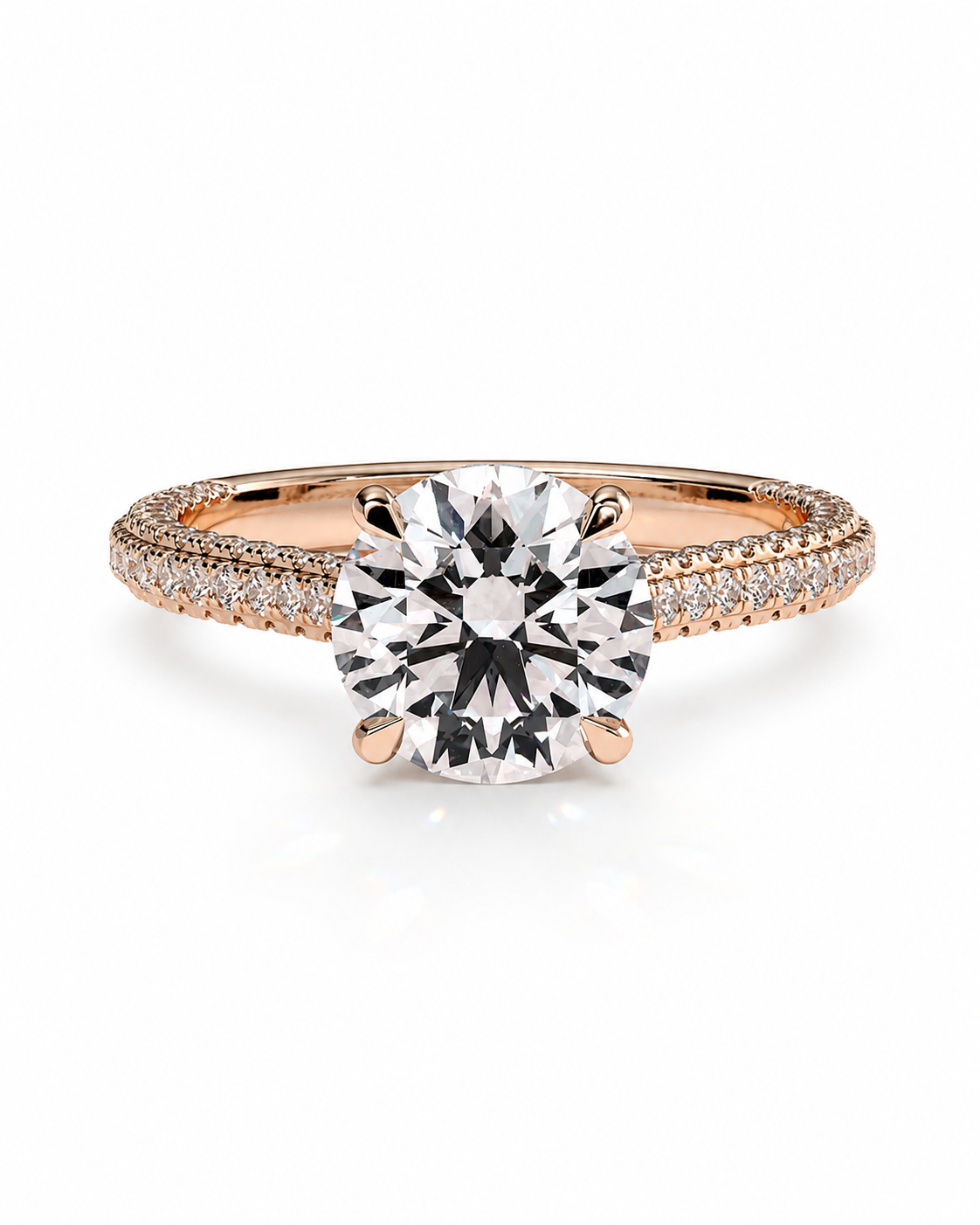color_10K_RG, color_14K_RG &&A rose gold engagement ring featuring a round brilliant-cut center stone in a four-prong setting, with a pave-set band adorned with small accent diamonds, shown on a clean white background.