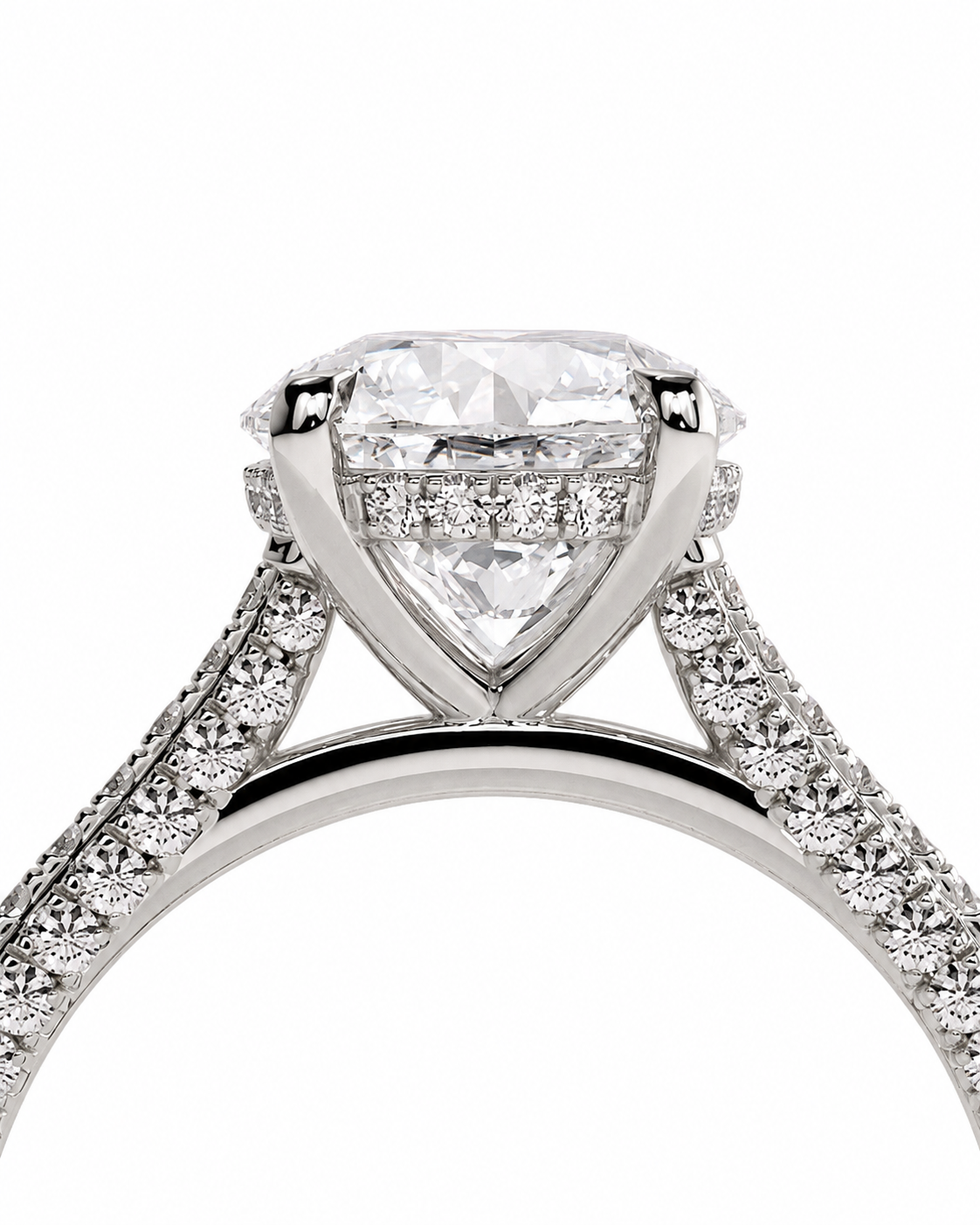 color_925_SIL,color_935_ARG,color_10K_WG, color_14K_WG &&A close-up studio shot of a diamond engagement ring with a large heart-shaped center stone and pave-set diamond shoulders on a white background.