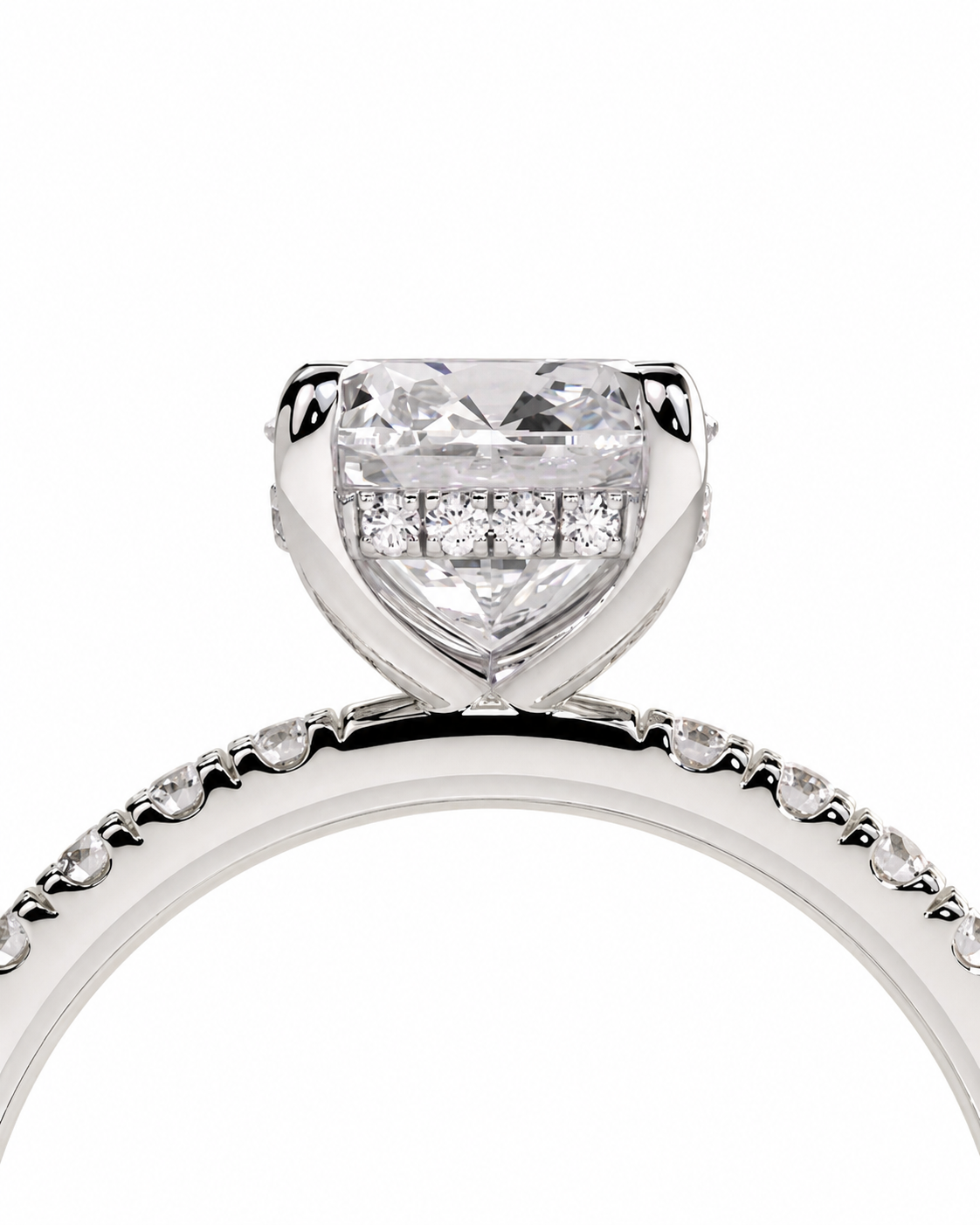 color_925_SIL,color_935_ARG,color_10K_WG, color_14K_WG &&A close-up of a heart-shaped diamond engagement ring in a silver-colored setting, with smaller diamonds along the band, on a plain white background.