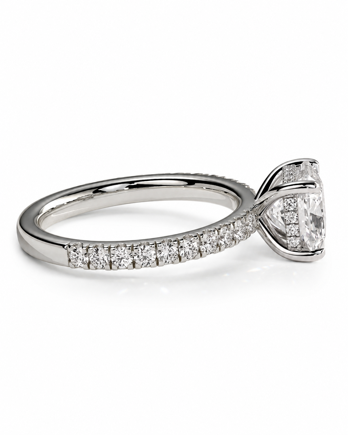 color_925_SIL,color_935_ARG,color_10K_WG, color_14K_WG &&A silver-toned diamond engagement ring featuring a large oval center stone and a pave band with smaller round diamonds, shown on a clean white background.