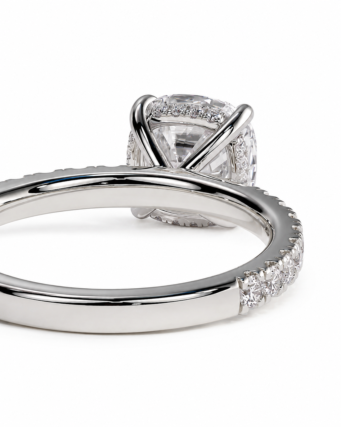 color_925_SIL,color_935_ARG,color_10K_WG, color_14K_WG &&Close-up of a silver-toned diamond ring with a large cushion-cut center stone and a halo of smaller diamonds, shown on a clean white background.