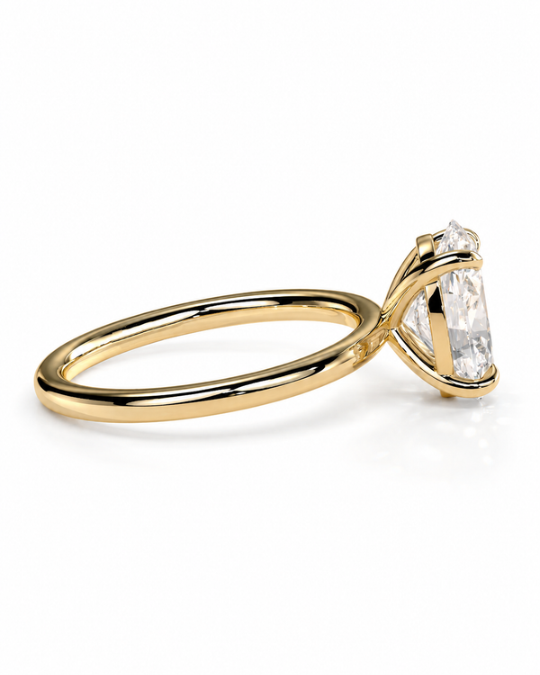 color_10K_YG, color_14K_YG &&A yellow gold solitaire engagement ring featuring a large, clear marquise-cut gemstone in a prong setting, shown on a clean white background.
