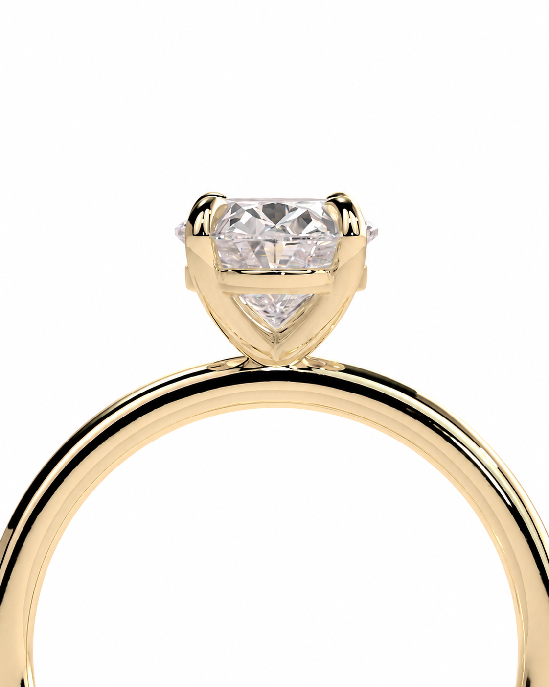 color_10K_YG, color_14K_YG &&A close-up of a yellow gold solitaire engagement ring featuring a heart-shaped clear gemstone in a prong setting, shown against a solid white background.