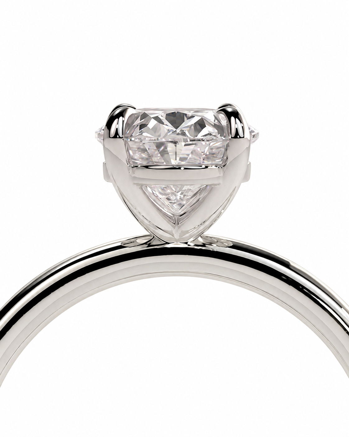 color_925_SIL,color_935_ARG,color_10K_WG, color_14K_WG &&A close-up shot of a silver-toned diamond ring with a heart-shaped clear gemstone in a prong setting, shown against a solid white background.