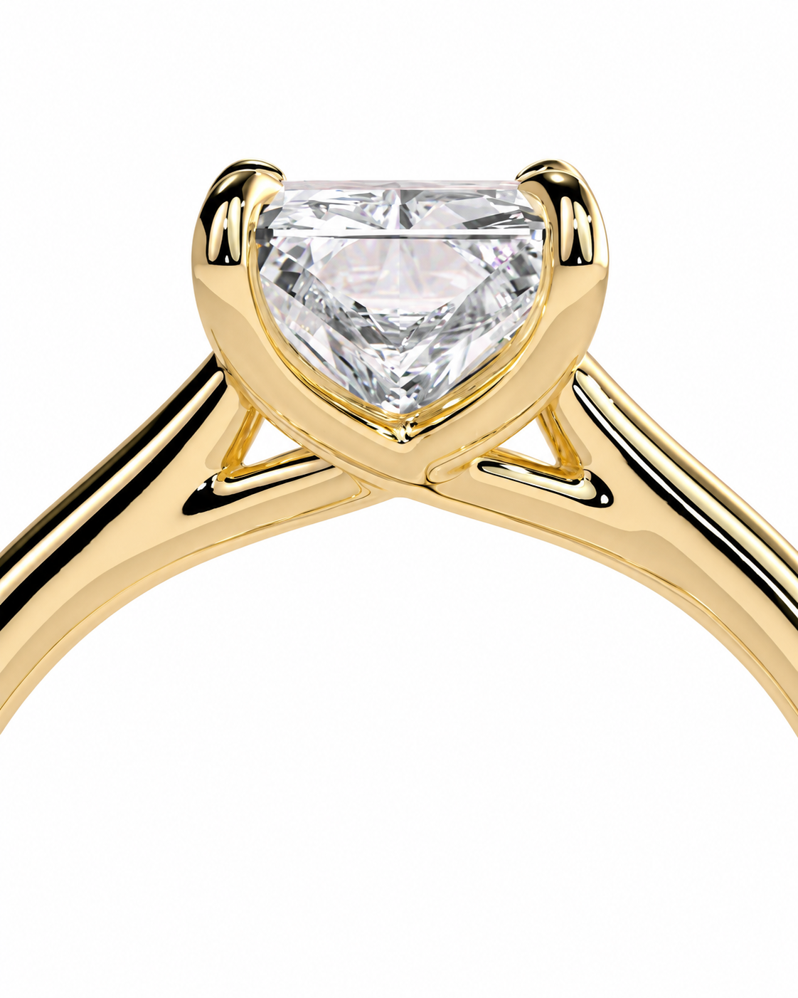 color_10K_YG, color_14K_YG &&A close-up of a yellow gold solitaire ring featuring a heart-shaped clear gemstone in a four-prong setting, shown against a plain white background.