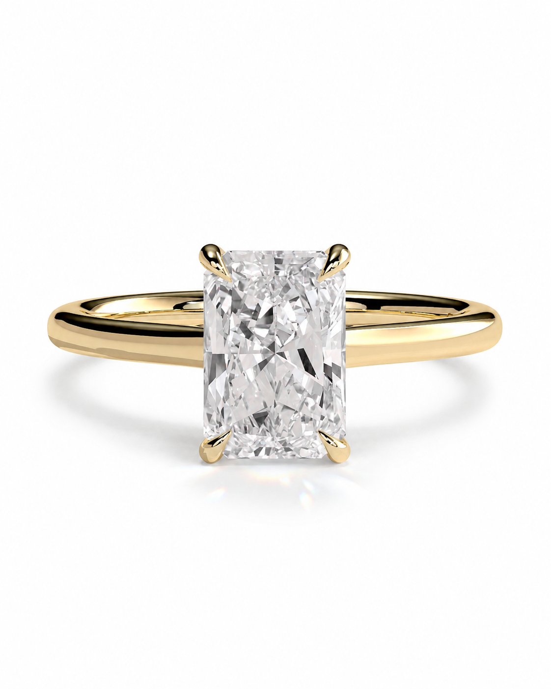 color_10K_YG, color_14K_YG &&An engagement ring featuring a rectangular radiant-cut diamond set in a yellow gold four-prong band, shown on a clean white background.