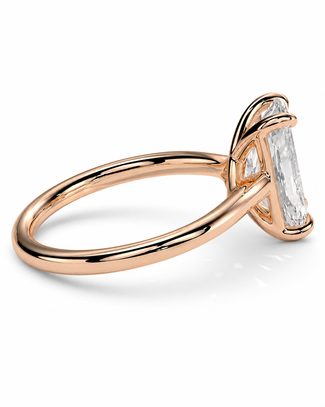 color_10K_RG, color_14K_RG &&A rose gold engagement ring featuring a large baguette-cut clear gemstone in a four-prong setting, shown on a clean white background.