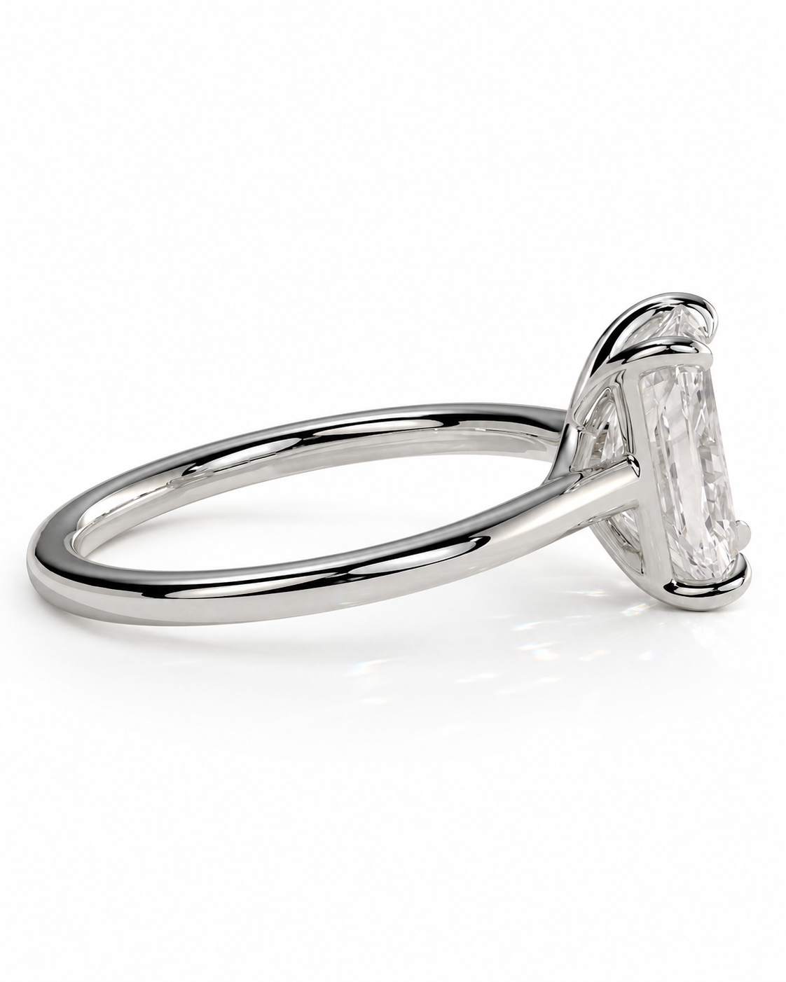 color_925_SIL,color_935_ARG,color_10K_WG, color_14K_WG &&A silver engagement ring featuring a rectangular baguette-cut clear gemstone in a four-prong setting, shown on a clean white background.