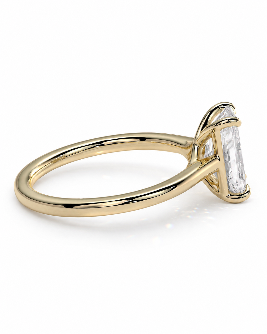 color_10K_YG, color_14K_YG &&A yellow gold ring featuring a baguette-cut clear gemstone in a prong setting, shown on a clean white background.