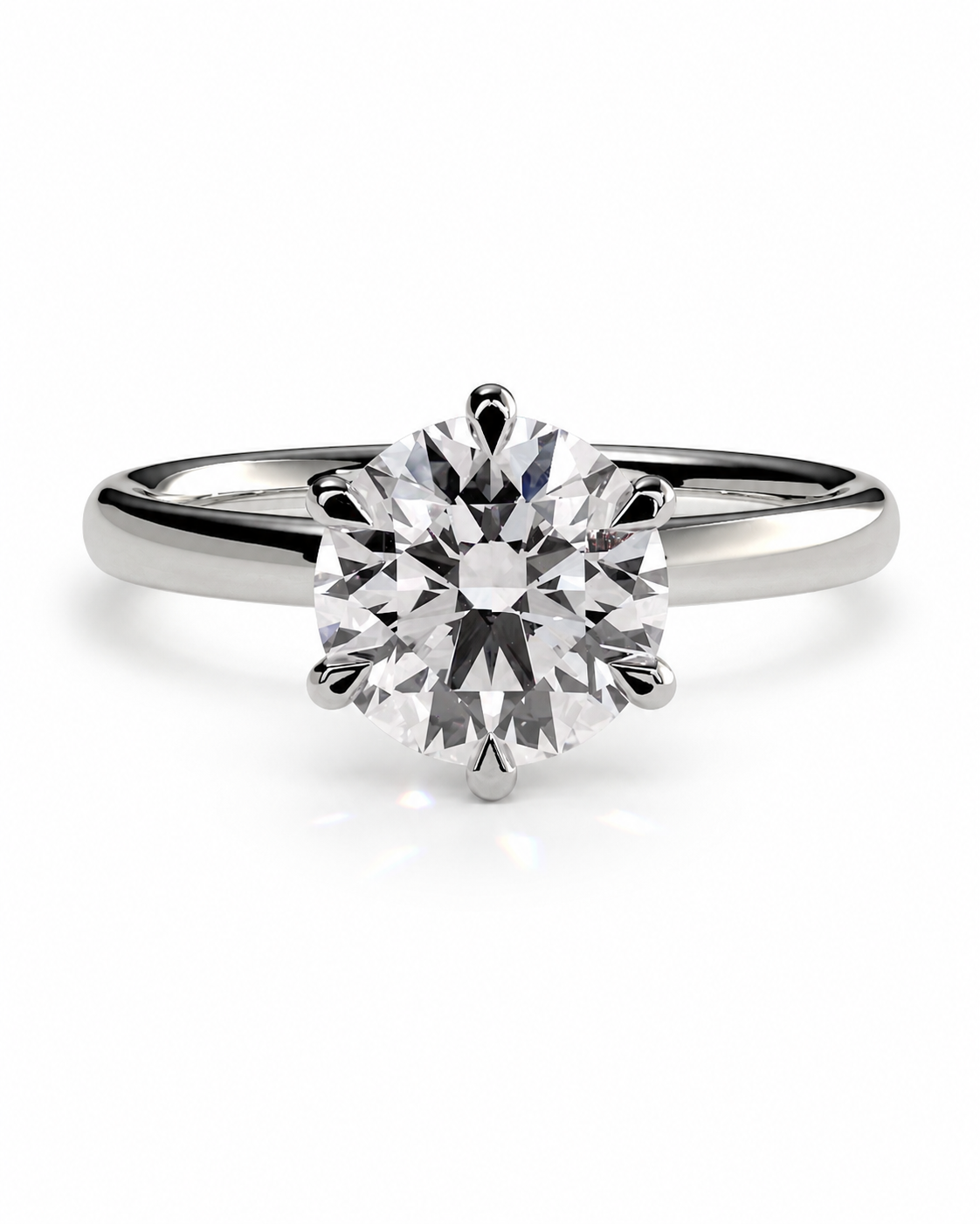 color_925_SIL,color_935_ARG,color_10K_WG, color_14K_WG &&A classic solitaire engagement ring featuring a round brilliant-cut diamond set in a polished silver-colored metal band, shown on a clean white background.