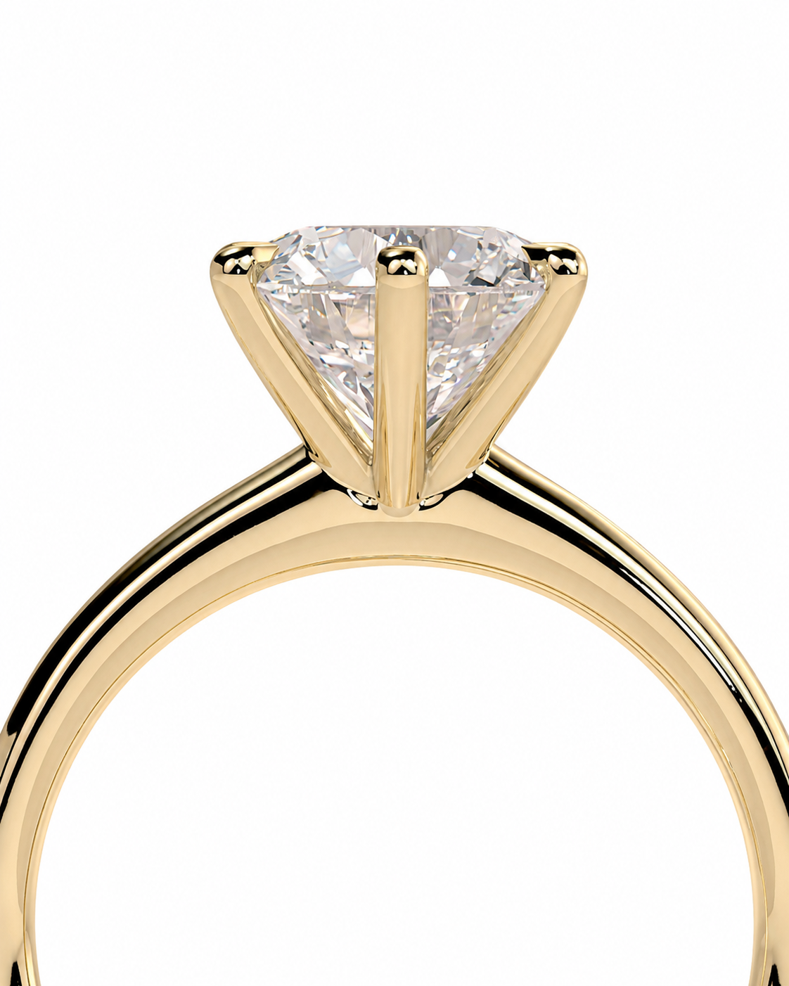 color_10K_YG, color_14K_YG &&A close-up of a yellow gold solitaire engagement ring featuring a large round brilliant-cut diamond in a four-prong setting, shown against a solid white background.