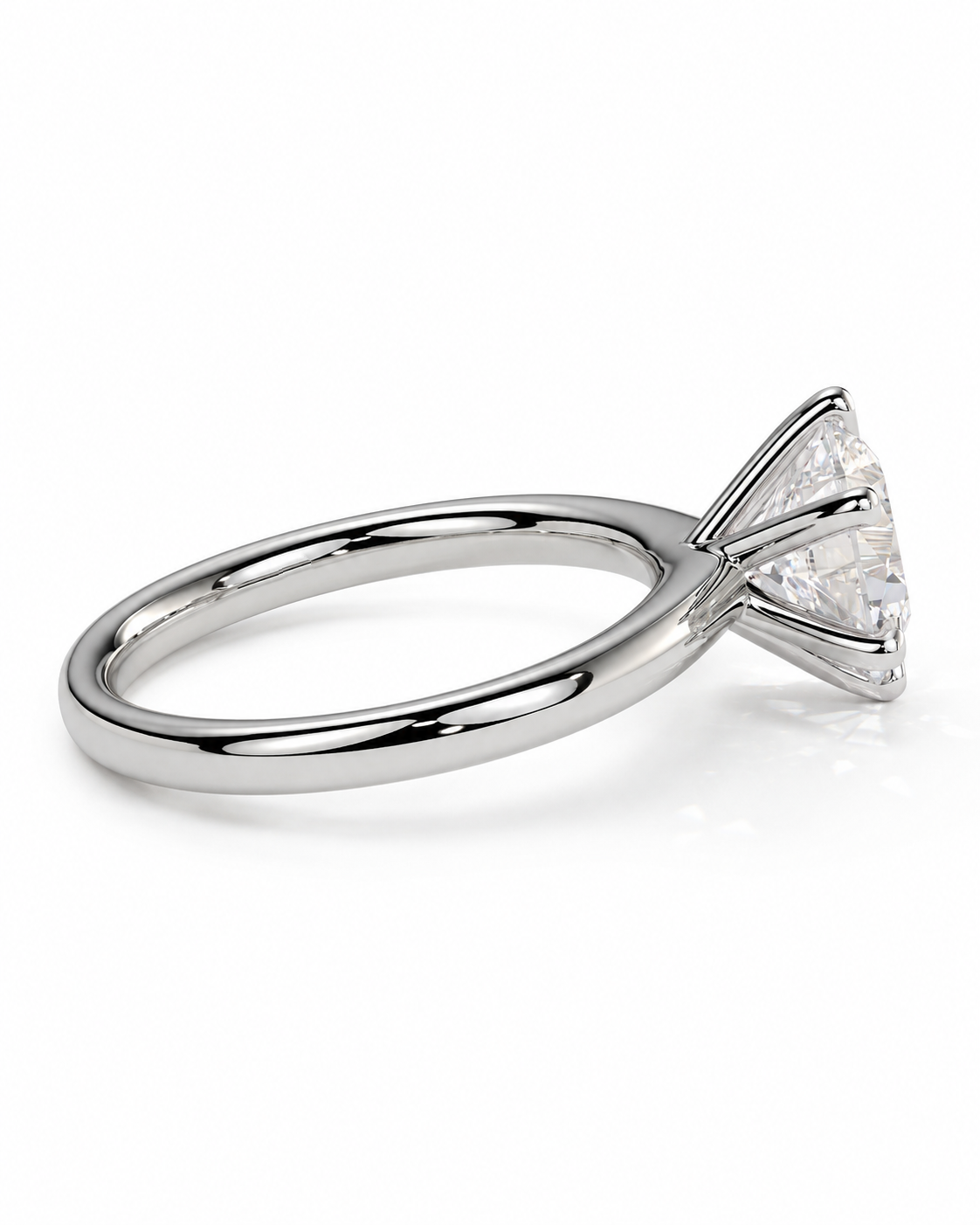 color_925_SIL,color_935_ARG,color_10K_WG, color_14K_WG &&A rose gold solitaire ring featuring a marquise-cut clear gemstone in a four-prong setting, shown on a clean white background.