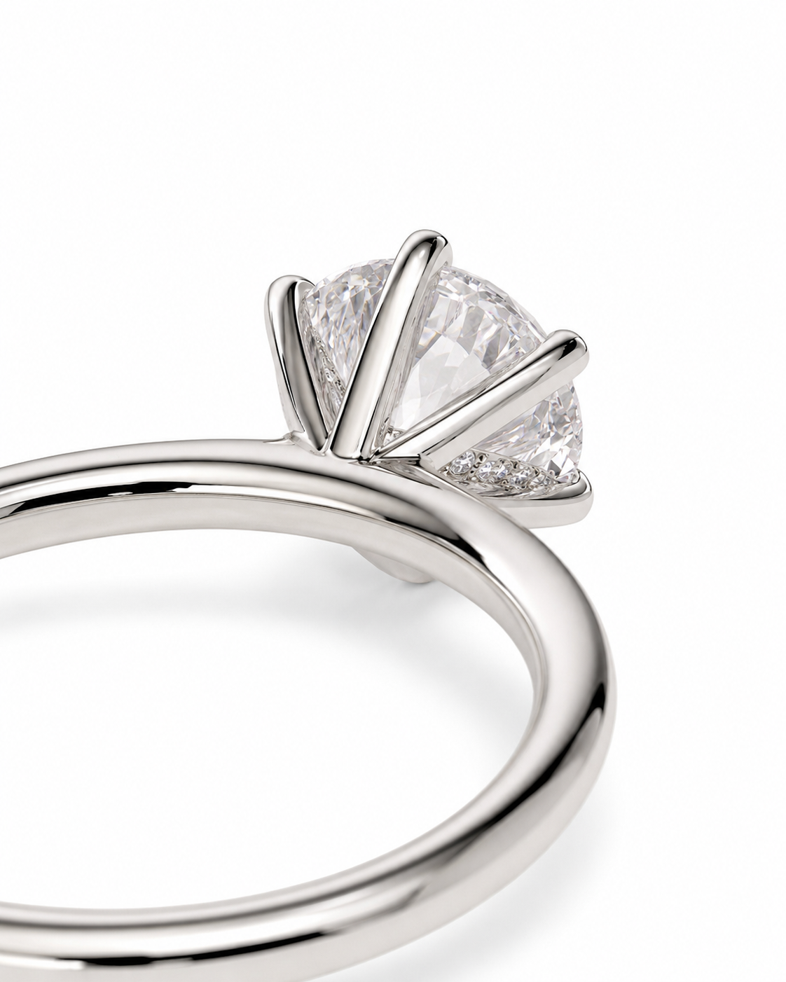 color_925_SIL,color_935_ARG,color_10K_WG, color_14K_WG &&A close-up of a silver-toned ring featuring a large oval clear gemstone in a prong setting, shown against a clean white background.