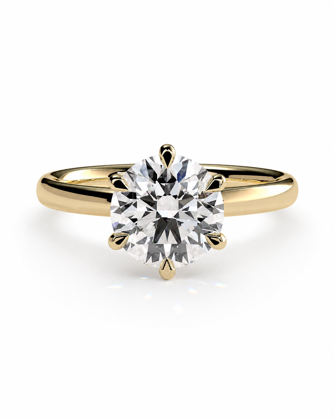 color_10K_YG, color_14K_YG &&A classic solitaire engagement ring featuring a round brilliant-cut diamond set in a yellow gold four-prong band, shown on a clean white background.