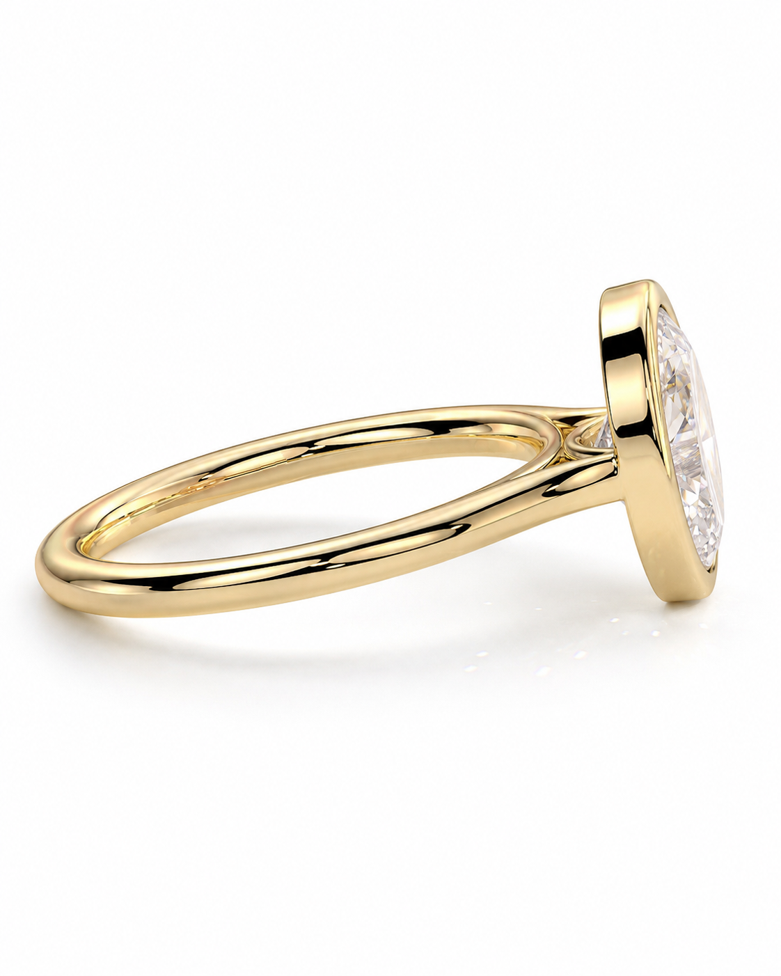 color_10K_YG, color_14K_YG &&A close-up side view of a yellow gold ring with a bezel-set clear oval gemstone on a white background.
