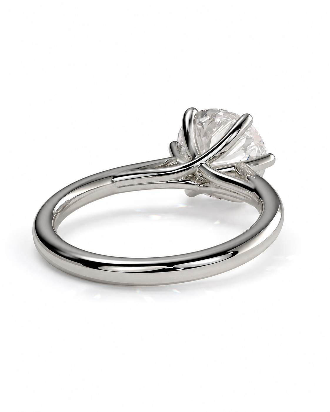 color_925_SIL,color_935_ARG,color_10K_WG, color_14K_WG &&A silver-toned solitaire engagement ring with a round brilliant-cut diamond, shown on a clean white background.