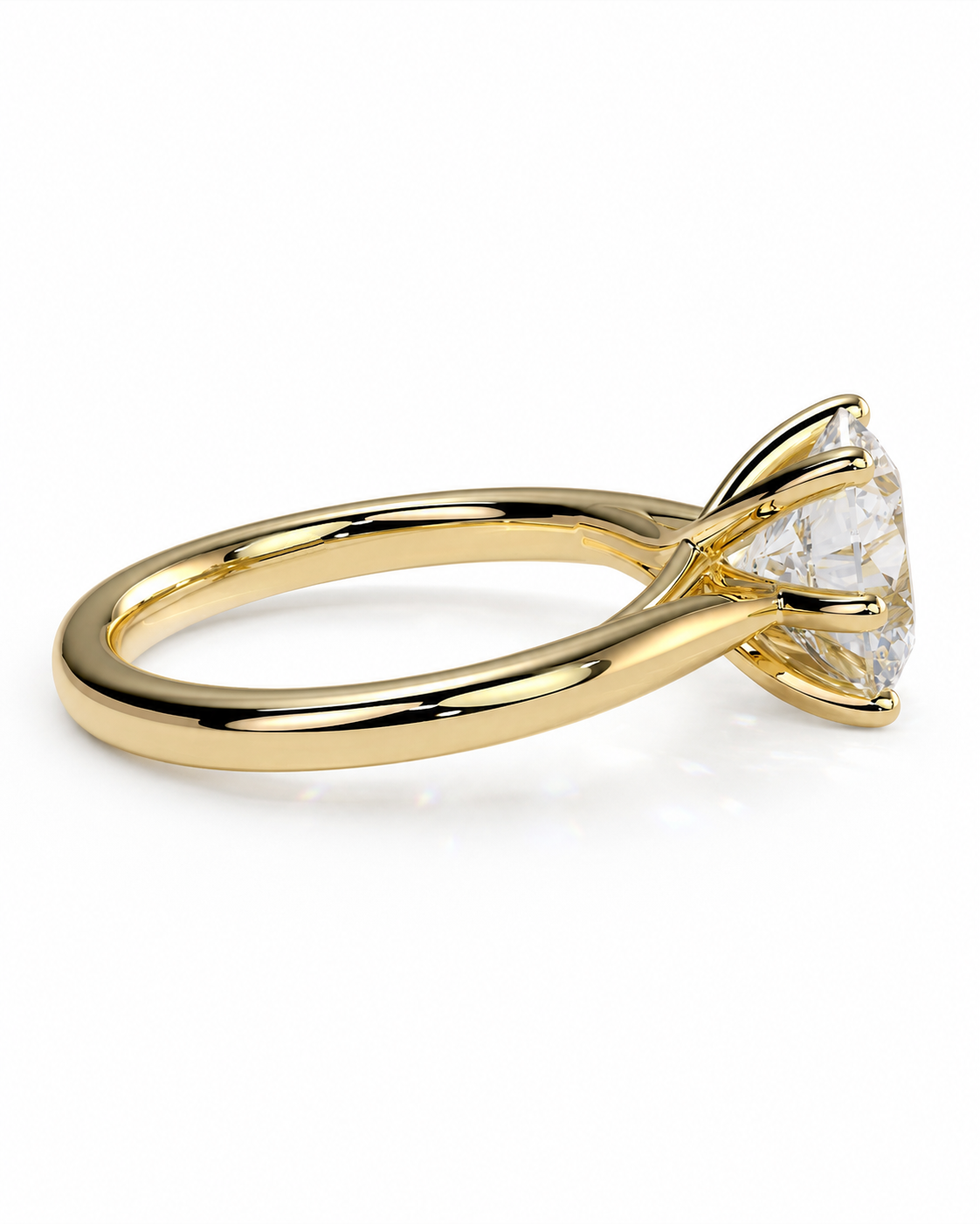 color_10K_YG, color_14K_YG &&A yellow gold solitaire engagement ring with a large clear round-cut gemstone in a four-prong setting, shown on a clean white background.