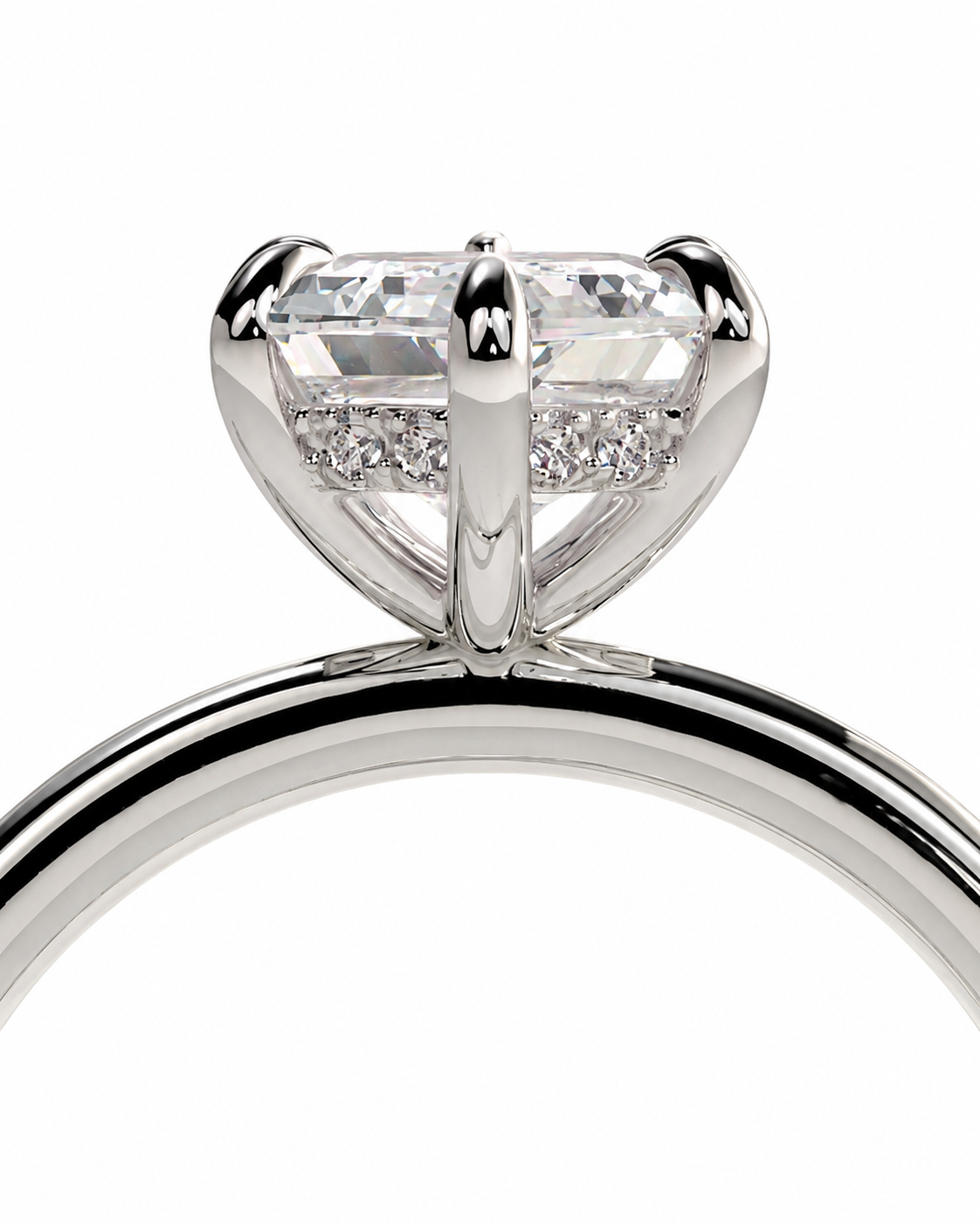 color_925_SIL,color_935_ARG,color_10K_WG, color_14K_WG &&A close-up studio shot of a silver-toned diamond ring with a large round brilliant-cut center stone and small pave accents on the band, set against a plain white background.