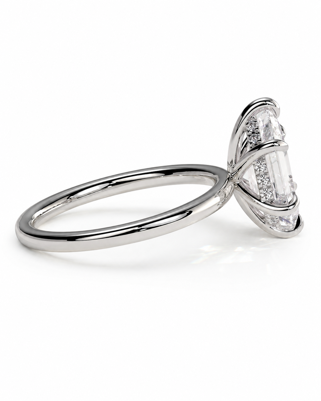 color_925_SIL,color_935_ARG,color_10K_WG, color_14K_WG &&A silver-toned diamond ring featuring a large baguette-cut center stone with smaller round diamonds in a prong setting, shown on a clean white background.