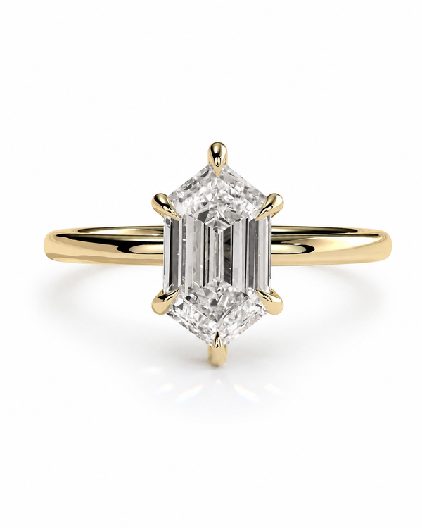 color_10K_YG, color_14K_YG &&A yellow gold ring featuring a large emerald-cut diamond solitaire in a six-prong setting, shown on a clean white background with a soft reflection.